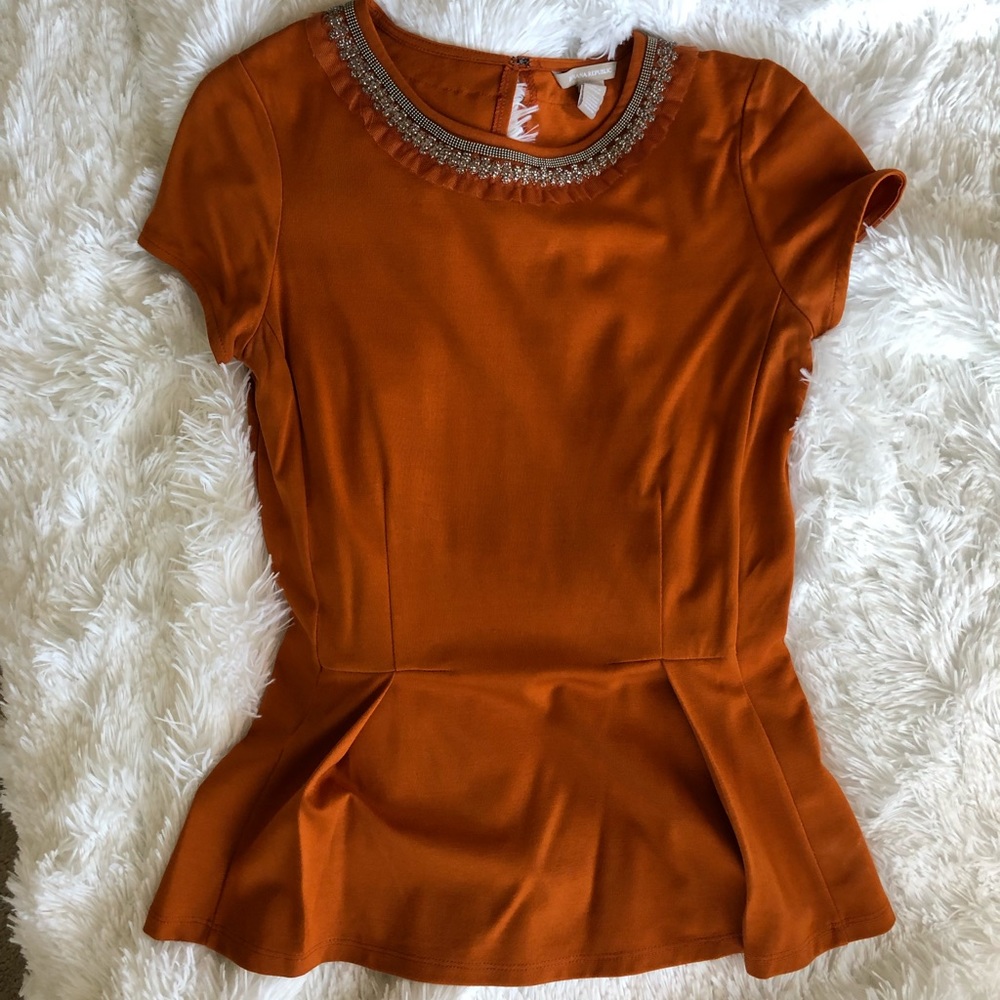 Tangerine peplum top